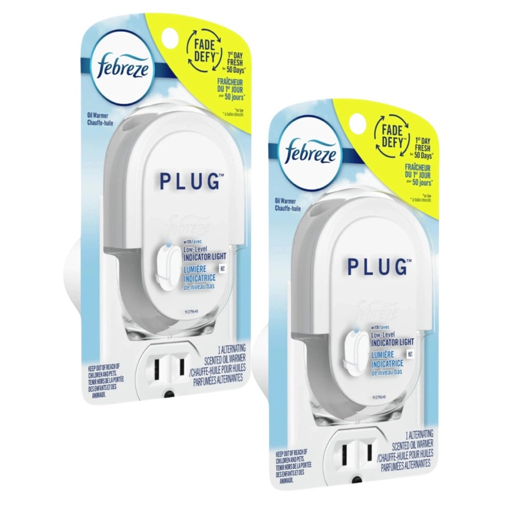 2 Febreze Plug Fade Defy scented oil warmers